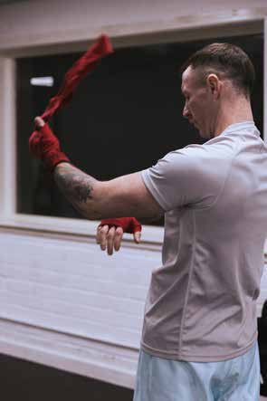 Roy Bannister preparing his boxing wraps