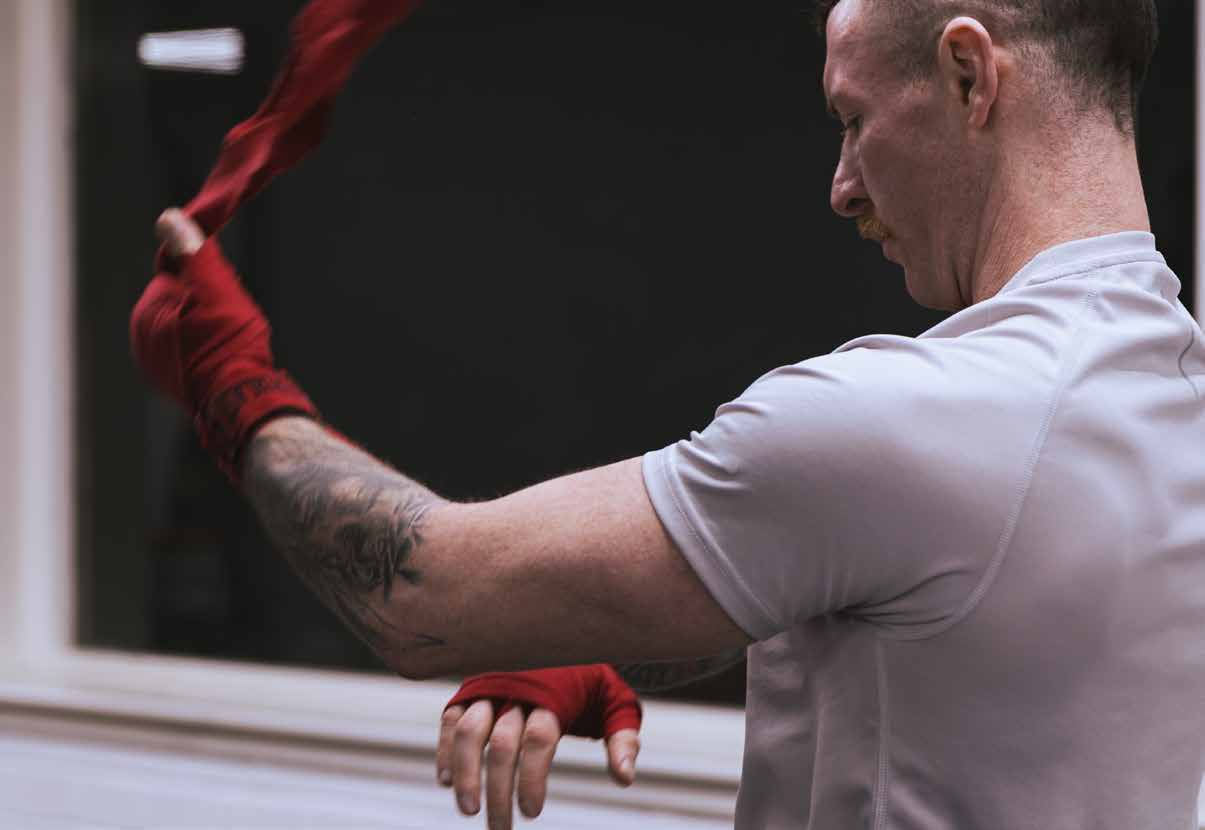 Roy Bannister preparing his boxing wraps